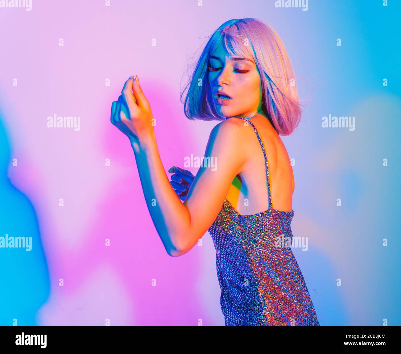 Fashion portrait of beautiful woman on colored background Stock Photo ...