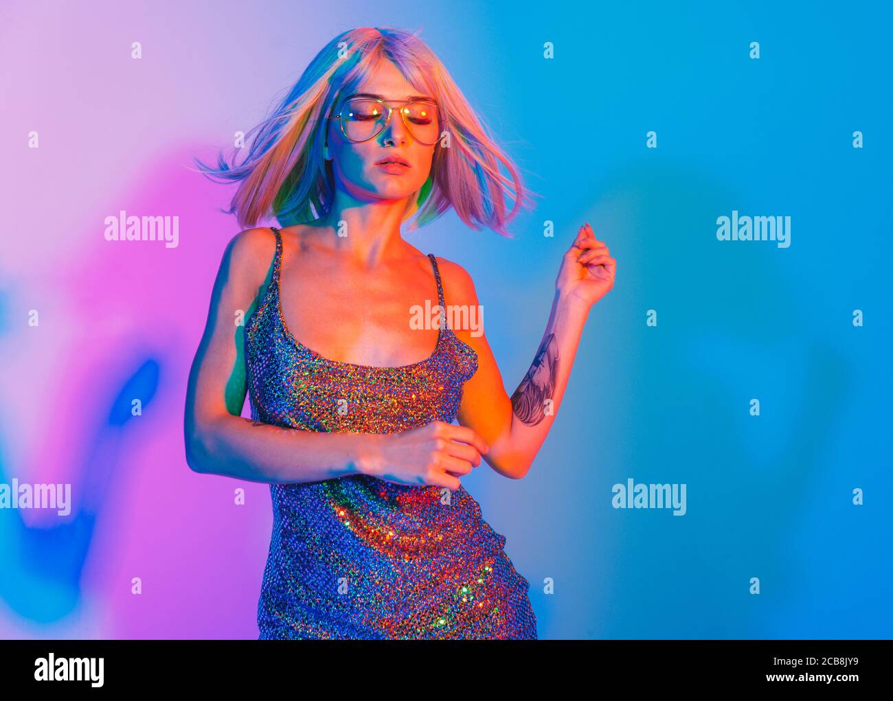 Fashion portrait of beautiful woman on colored background Stock Photo ...
