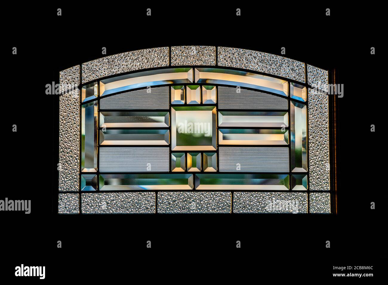 Leaded glass window in the front entrance door of a private residence Stock Photo