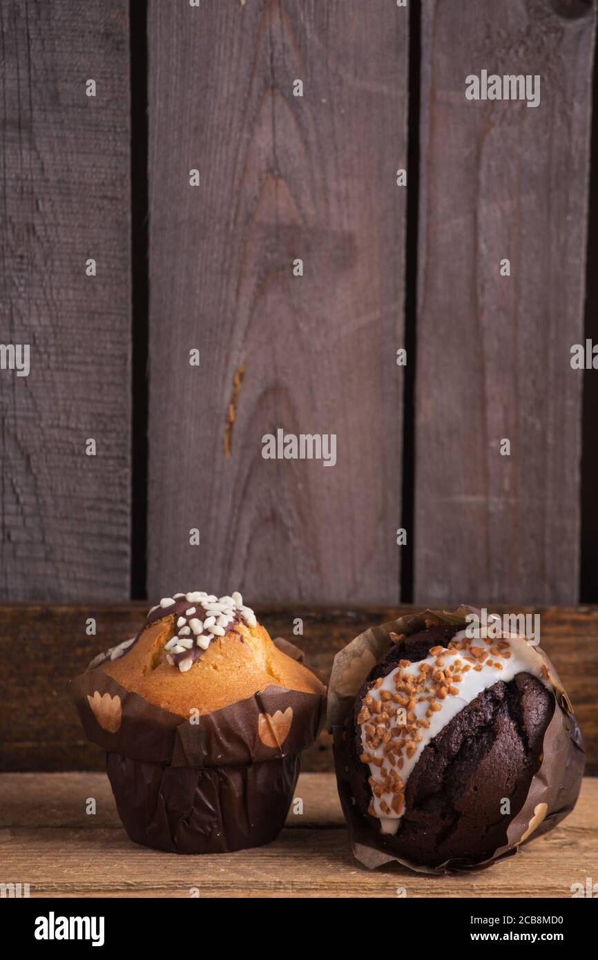 Chocolate muffins with edible eyes in paper holders Stock Photo - Alamy