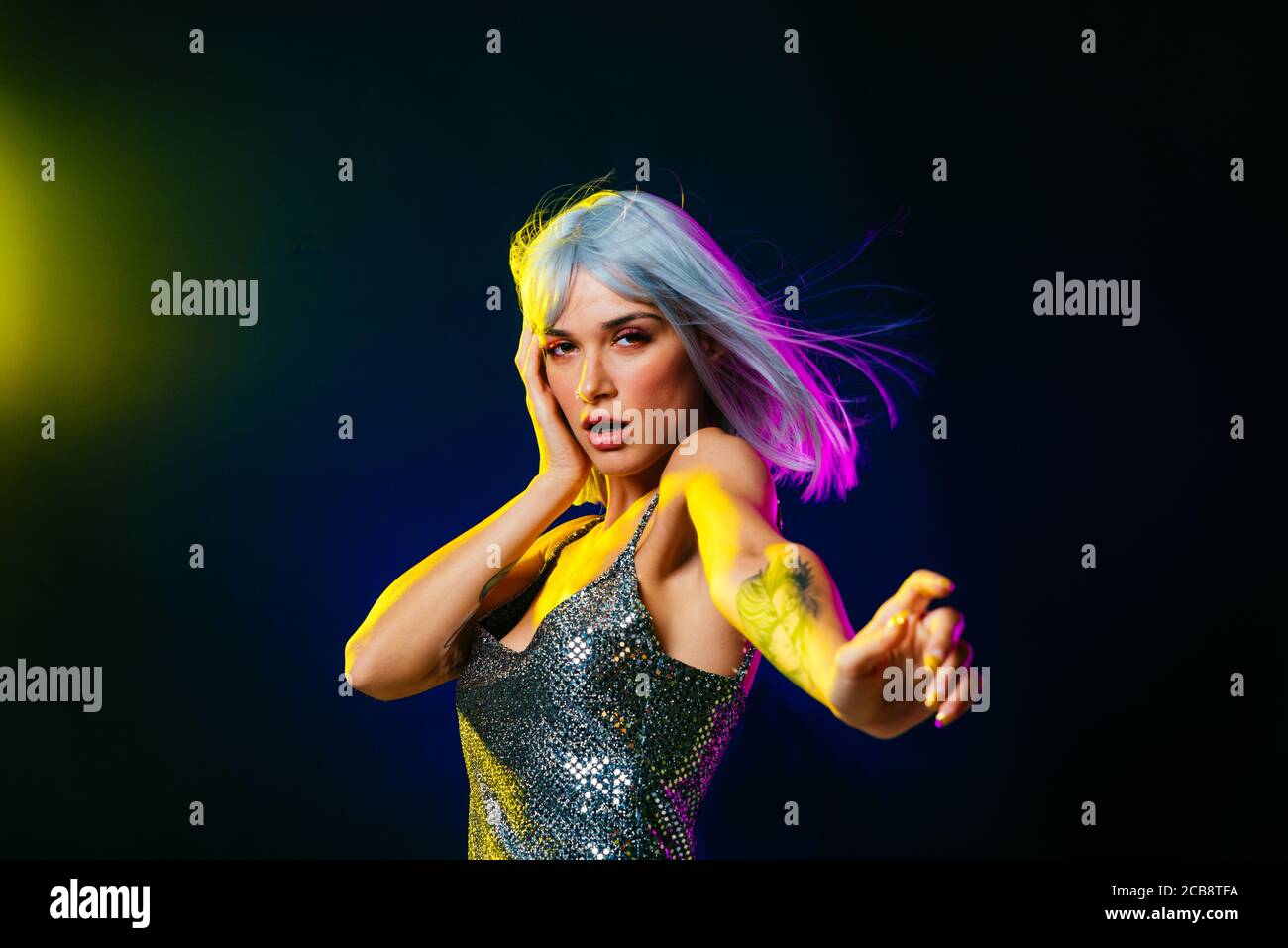 Fashion portrait of beautiful woman on colored background Stock Photo ...