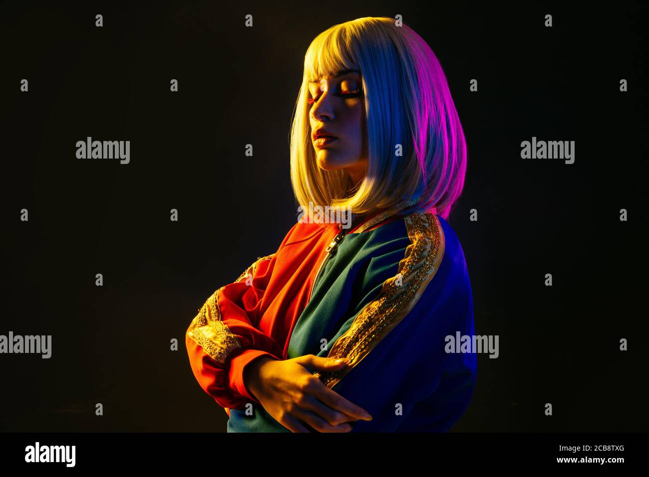 Fashion portrait of beautiful woman on colored background Stock Photo ...