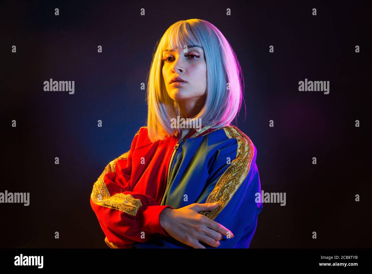 Fashion portrait of beautiful woman on colored background Stock Photo ...