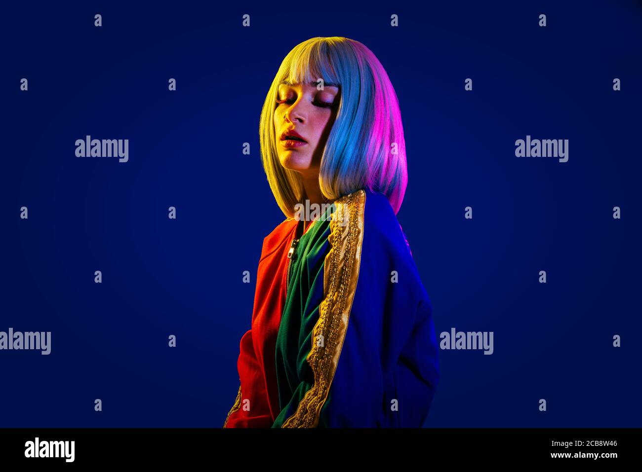 Fashion portrait of beautiful woman on colored background Stock Photo ...