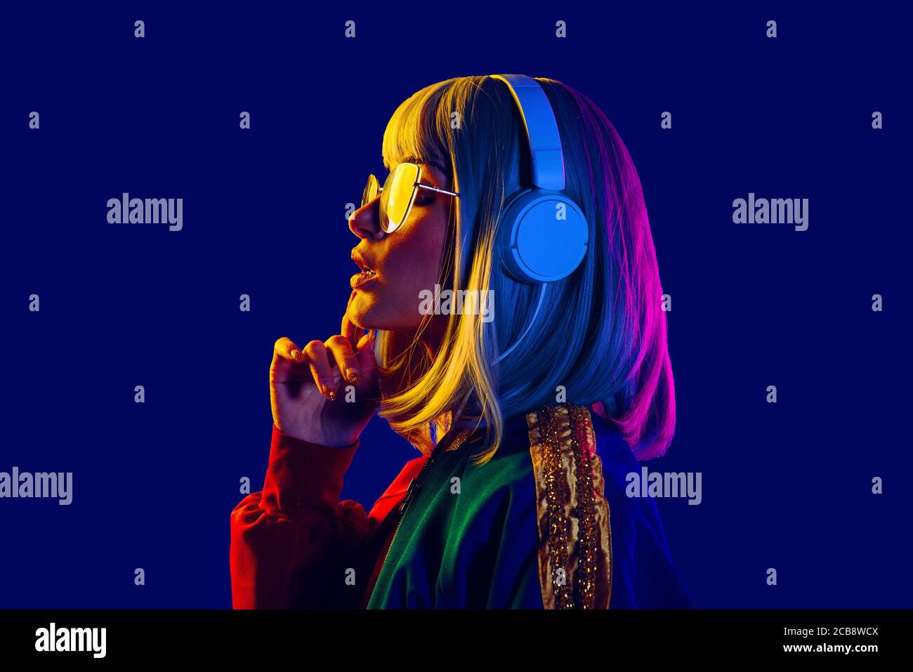 Fashion portrait of beautiful woman on colored background Stock Photo ...