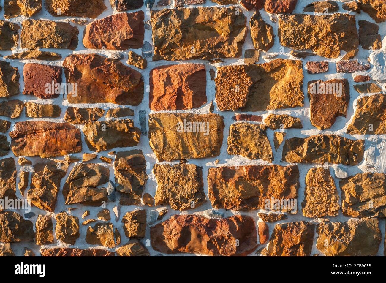 Rough sandstone wall closeup closeup as stone background Stock Photo