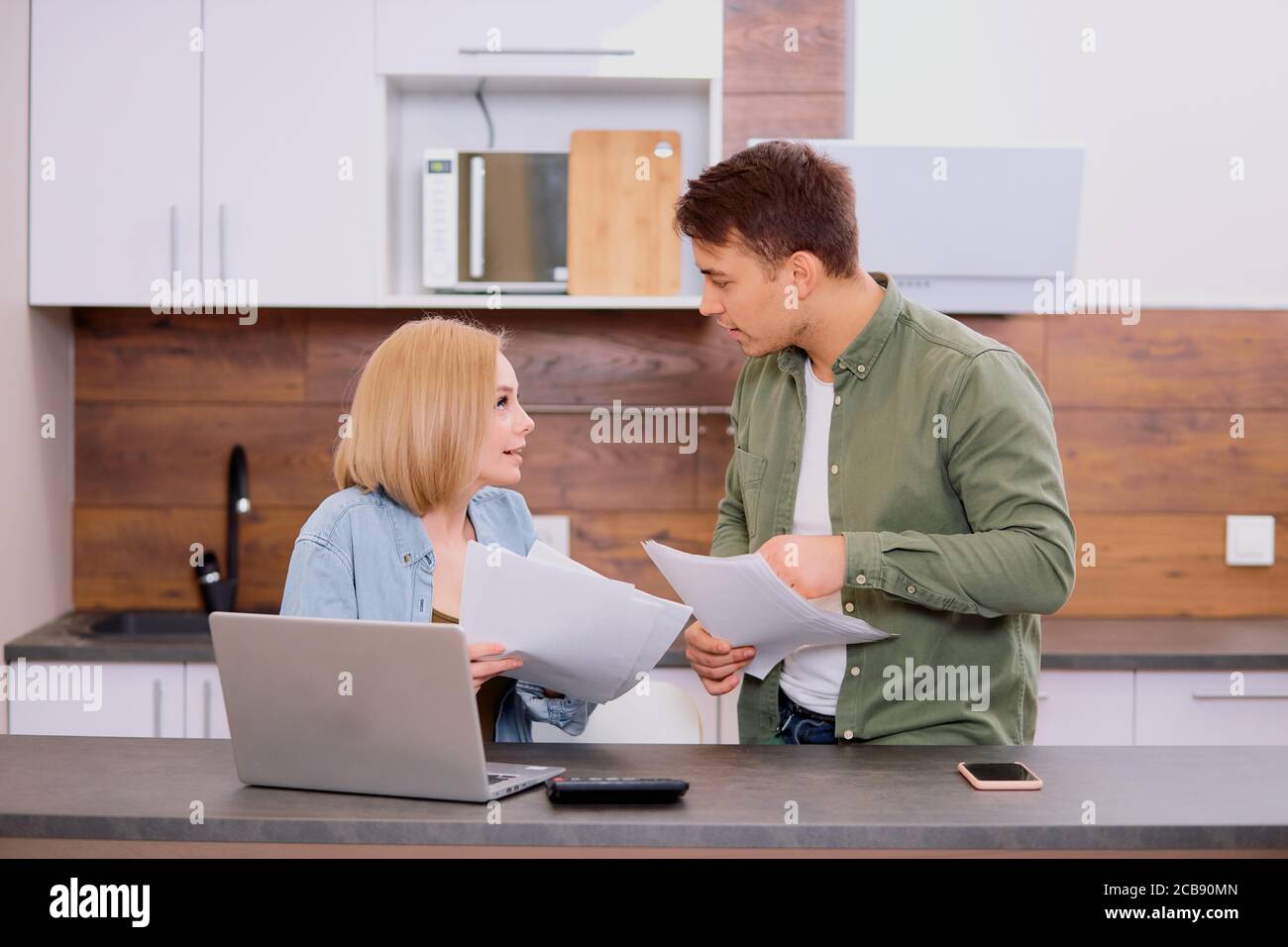 Woman utility bill showing hi-res stock photography and images - Alamy