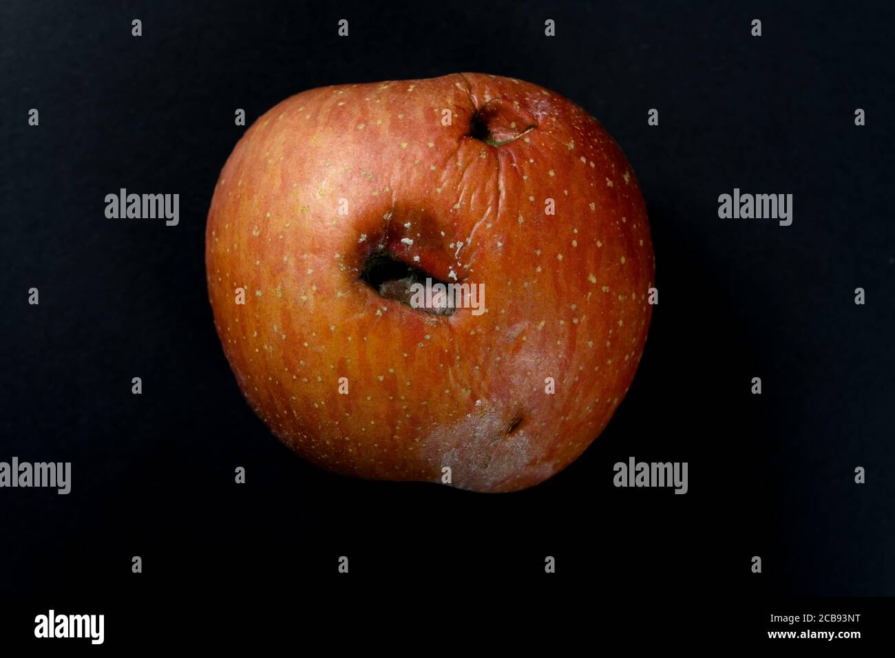 Rotten apple black background hi-res stock photography and images - Alamy