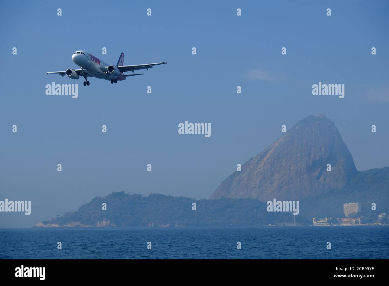 Brazil Rio de Janeiro - Airplane in landing approach to RJ Santos Dumont city Airport Stock Photo