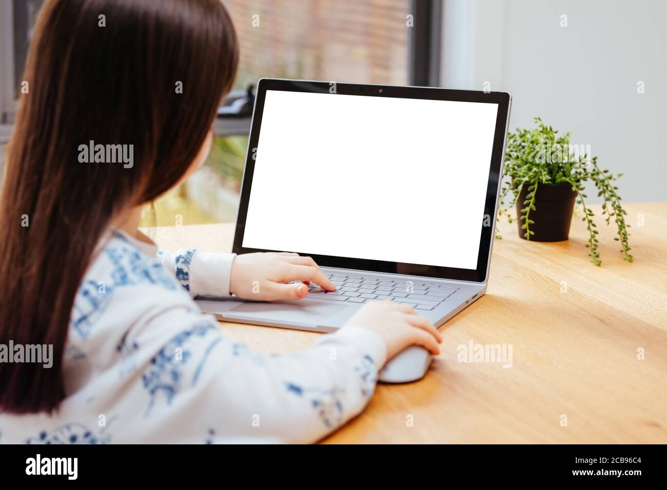 Child Uses a Computer for School Work Stock Photo Alamy