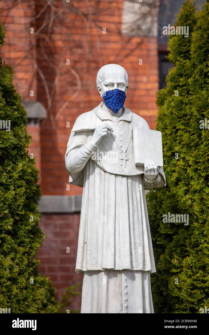 Herkimer, New York A statue of St. Francis DeSales has donned a mask