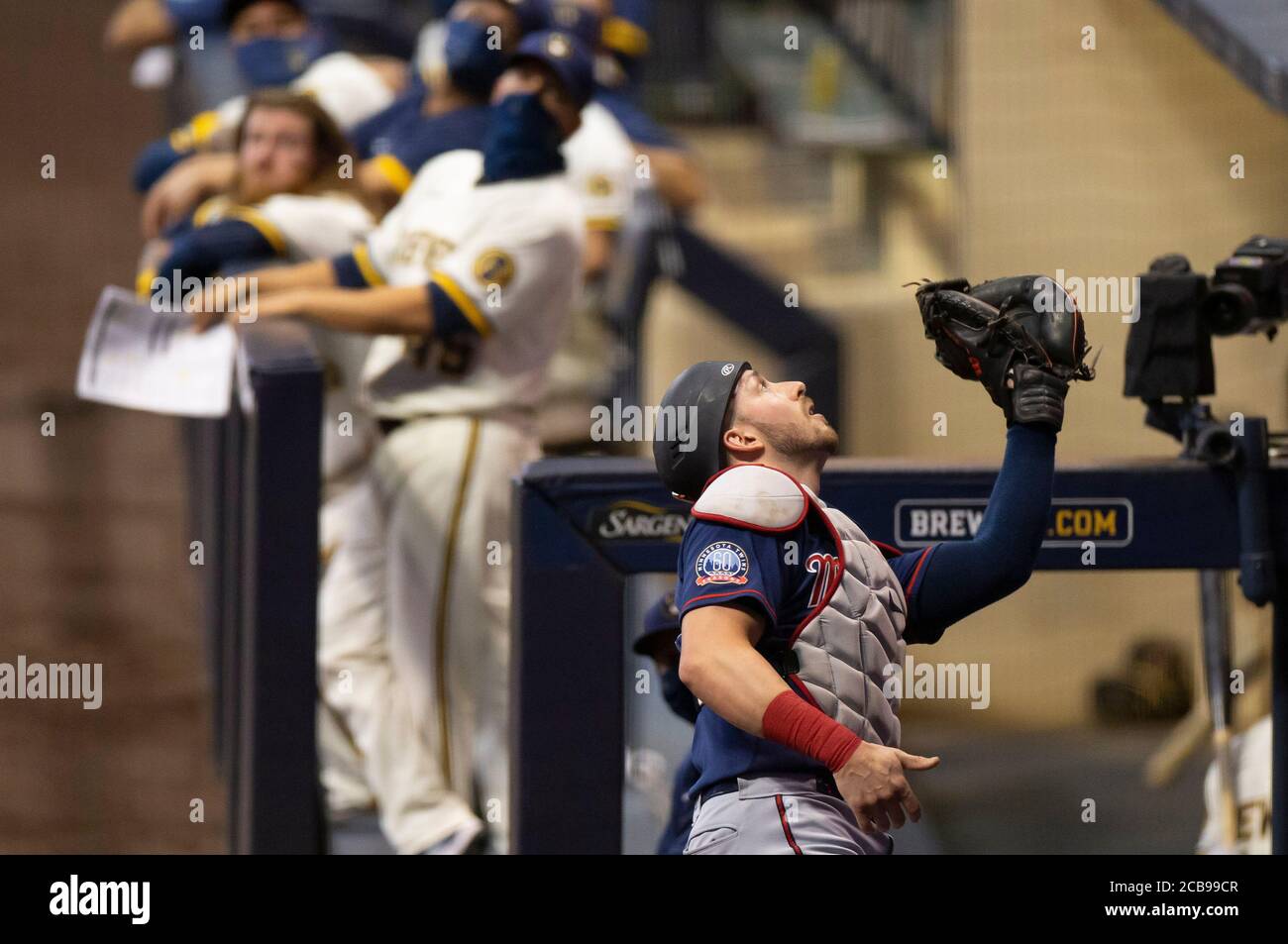 Minnesota Twins' Mitch Garver catches against the Detroit Tigers