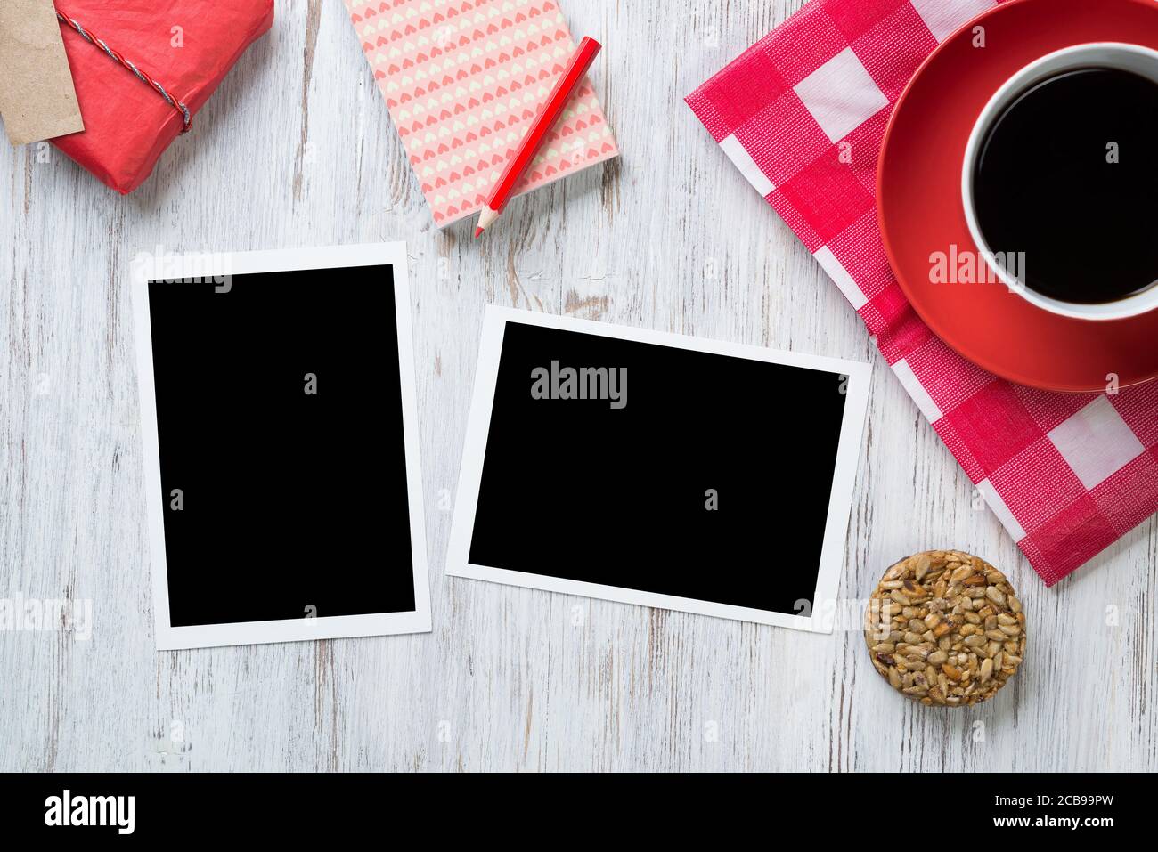 Blank photo frames on table Stock Photo