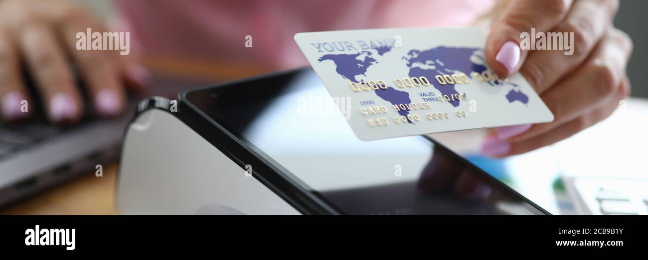 Woman working in bank Stock Photo