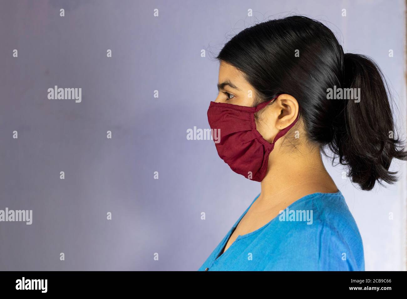 Woman wearing face mask side hi-res stock photography and images - Alamy