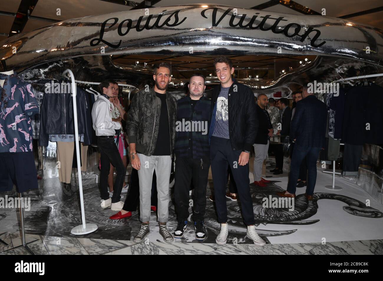 Jordan Barrett (Model & Actor) and Kim Jones (Louis Vuitton Men's Artistic  Director) at the opening of the first Louis Vuitton men's pop up store  Stock Photo - Alamy