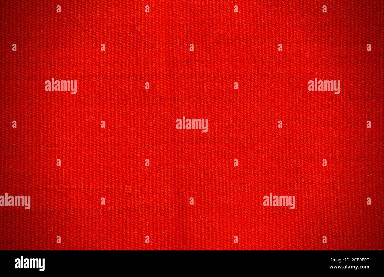 Natural red background of thick fabric. Fabric texture Stock Photo