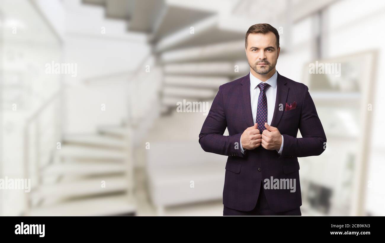 Sharp-dressed successful and masculinity man at men's beauty salon. Picture for advertising a men's beauty salon. Stock Photo