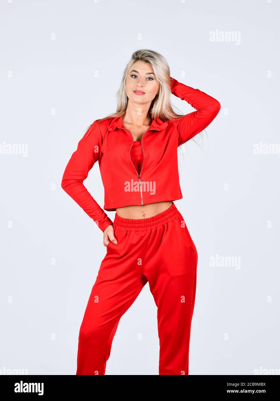 sportswear shop. fit woman in tracksuit. sporty woman in homewear isolated  on white. feeling cozy and comfortable. sexy fitness girl. sport clothes  trend. female sport fashion. Glamour fashion model Stock Photo -