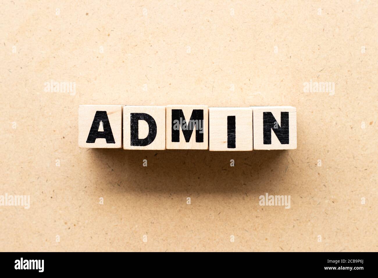 Letter block in word admin on wood background Stock Photo