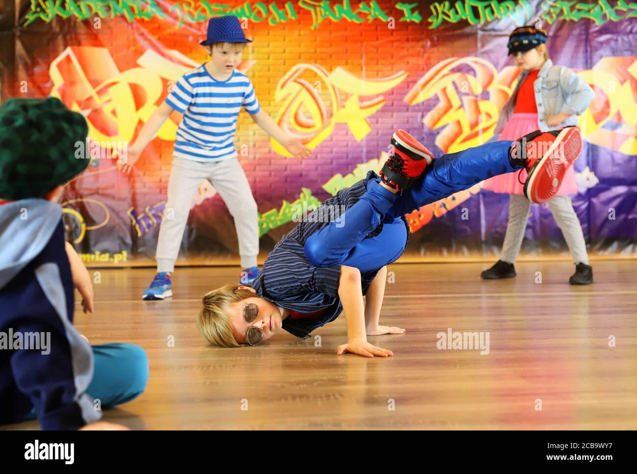 little boy in a unique breakdance position, street dancer, breakdance kids Stock Photo
