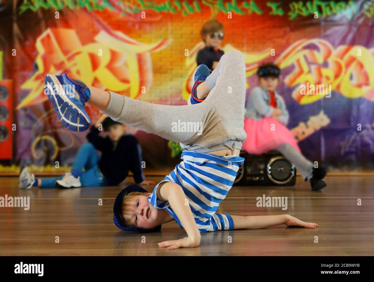 little boy in a unique breakdance position, street dancer, breakdance kids Stock Photo