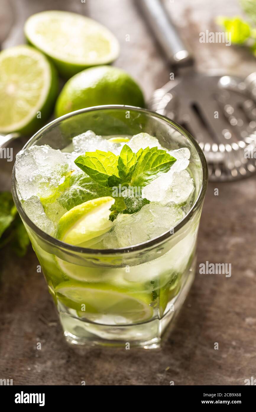 Mojito cocktail drink with white rum lime mint herbs and soda on the bar counter Stock Photo Alamy