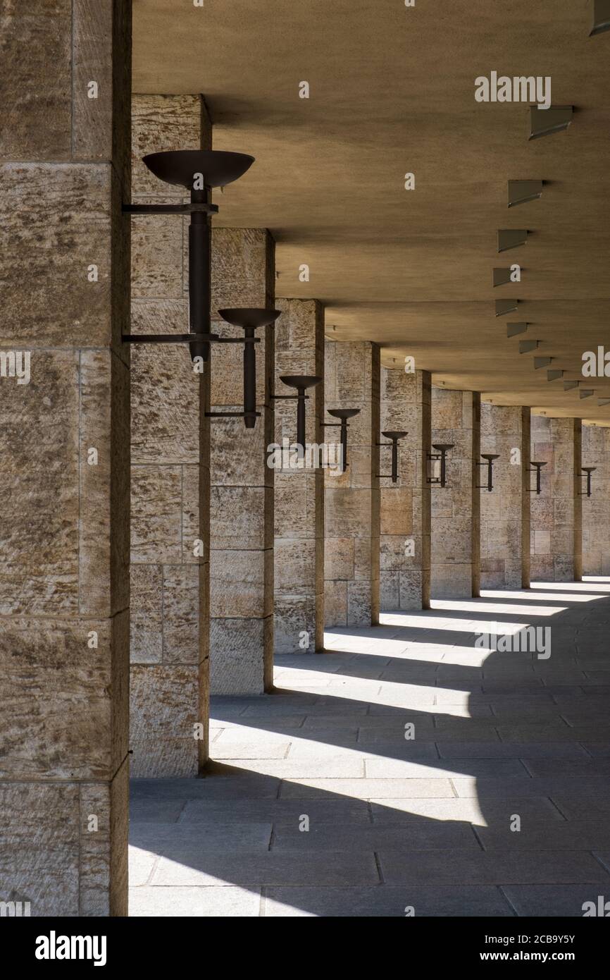 Classic Nazi architecture with line of pillars along corridor in Berlin Olympic Stadium Stock Photo