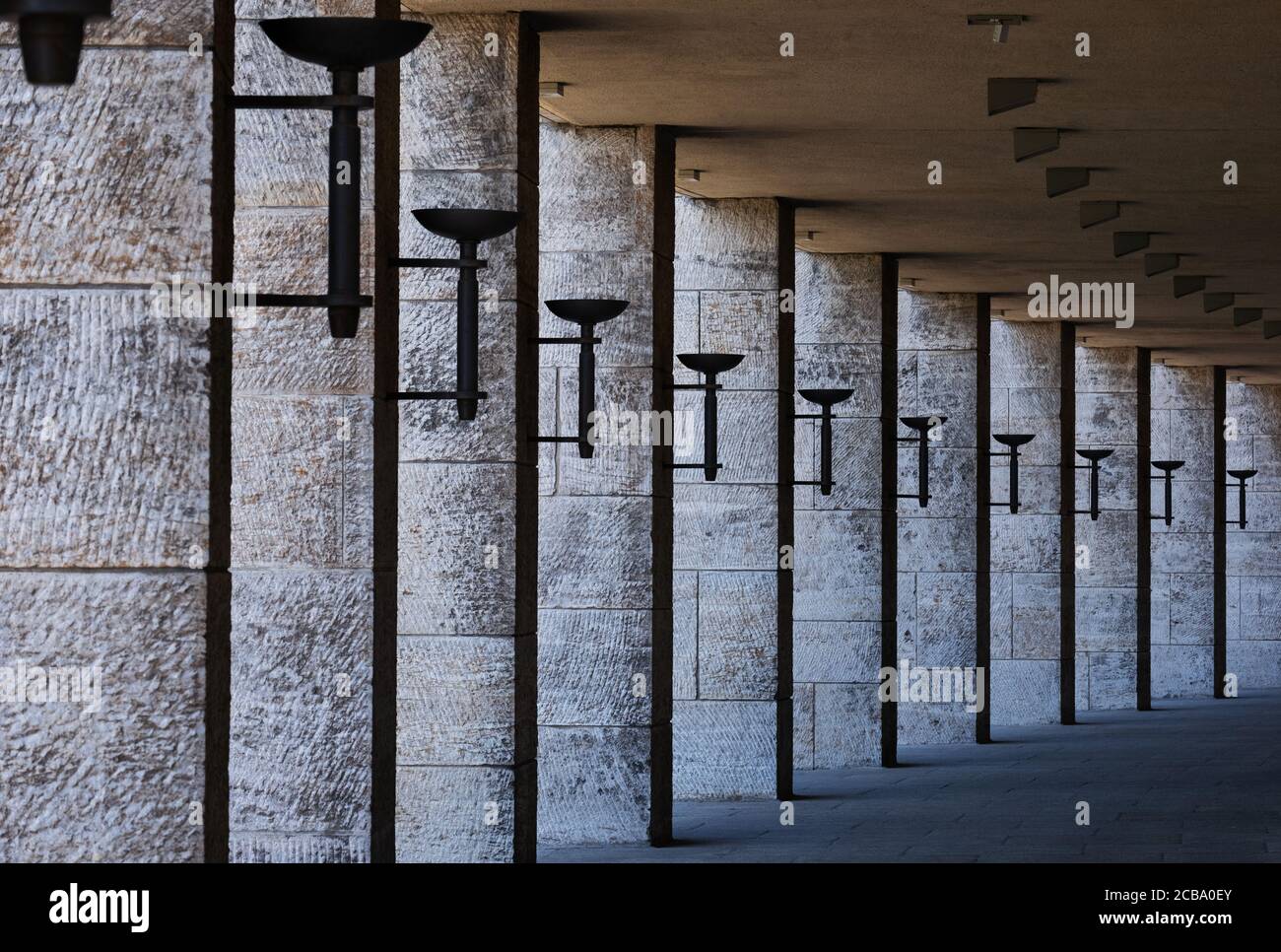 Classic Nazi architecture with line of pillars along corridor in Berlin Olympic Stadium Stock Photo