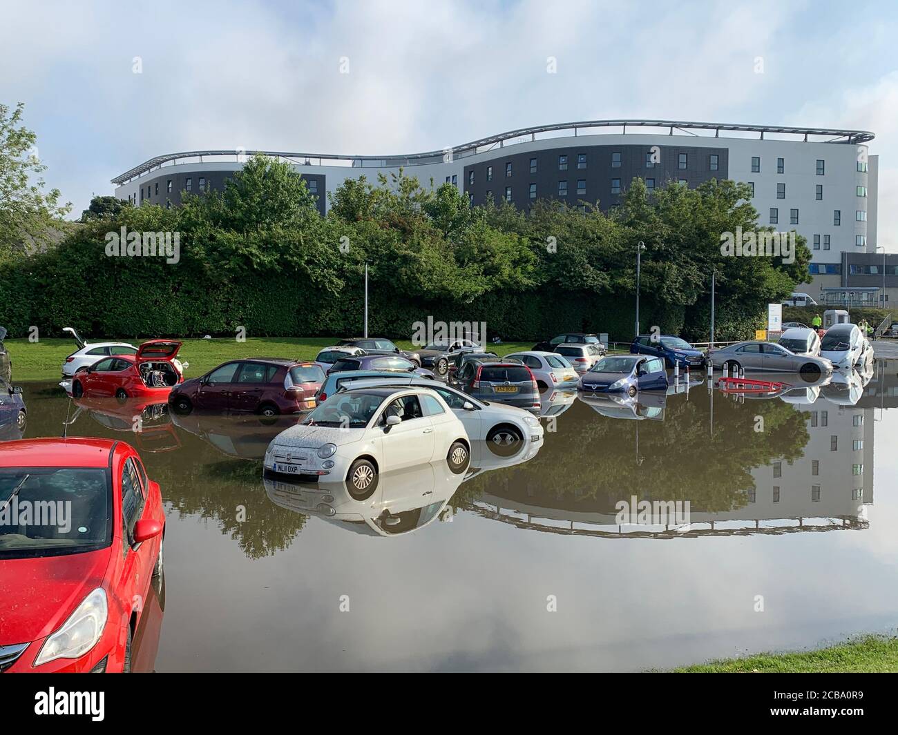 Flooding at Queen Victoria Hospital car park, in Kirkcaldy, Fife, Scotland. Thunderstorm warnings are still current for most of the UK on Wednesday, while high temperatures are forecast again for many parts of England. Stock Photo
