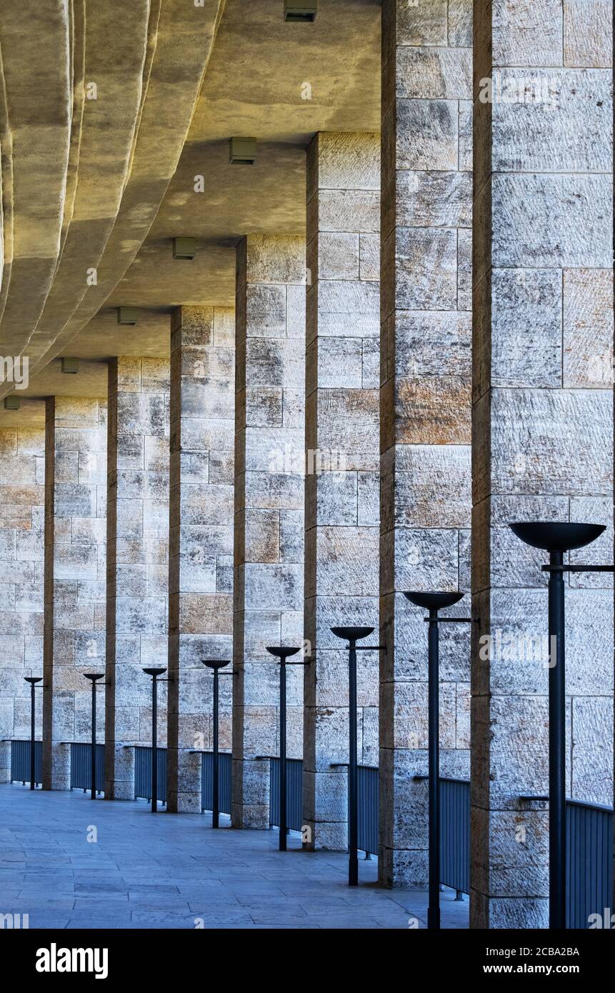 Classic Nazi architecture with line of pillars along corridor in Berlin Olympic Stadium Stock Photo