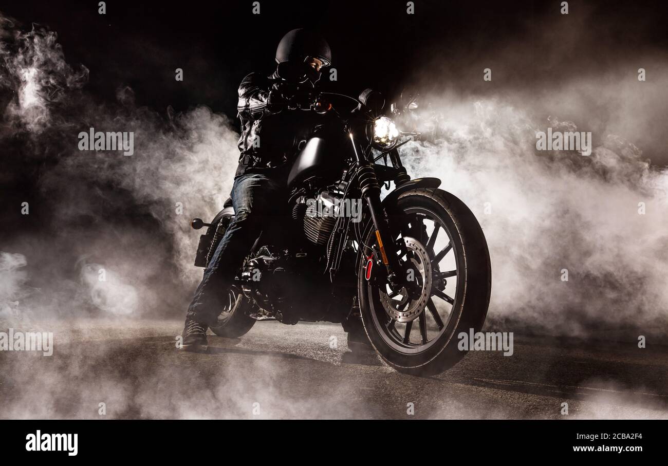 Dark motorcycle driver in fog. Wallpaper design of high power motorbike Stock Photo - Alamy Dark motorcycle driver in fog. Wallpaper design of high power motorbike Stock Photo - Alamy