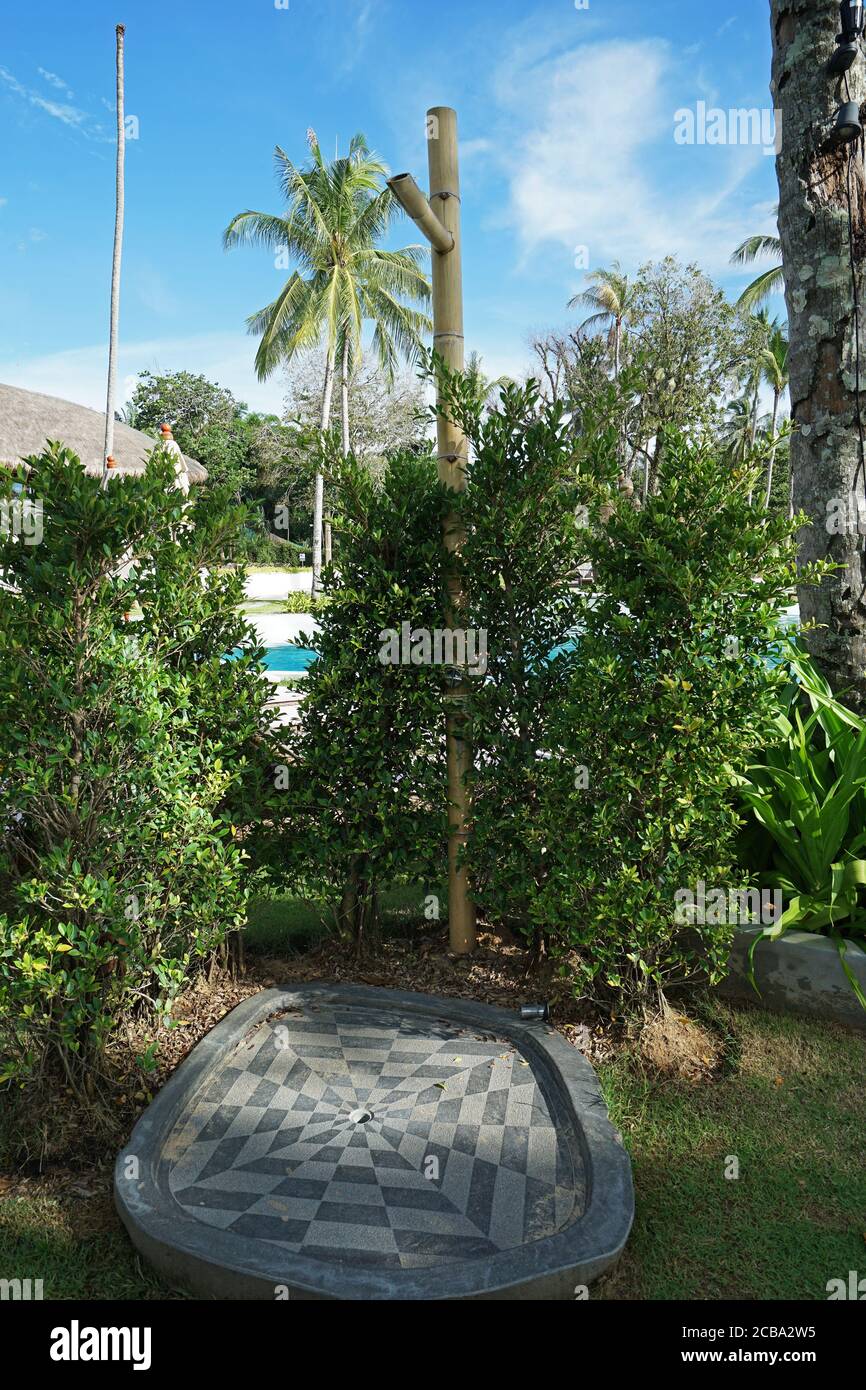 Tropical outdoor poolside showers by the swimming pool Stock Photo Alamy