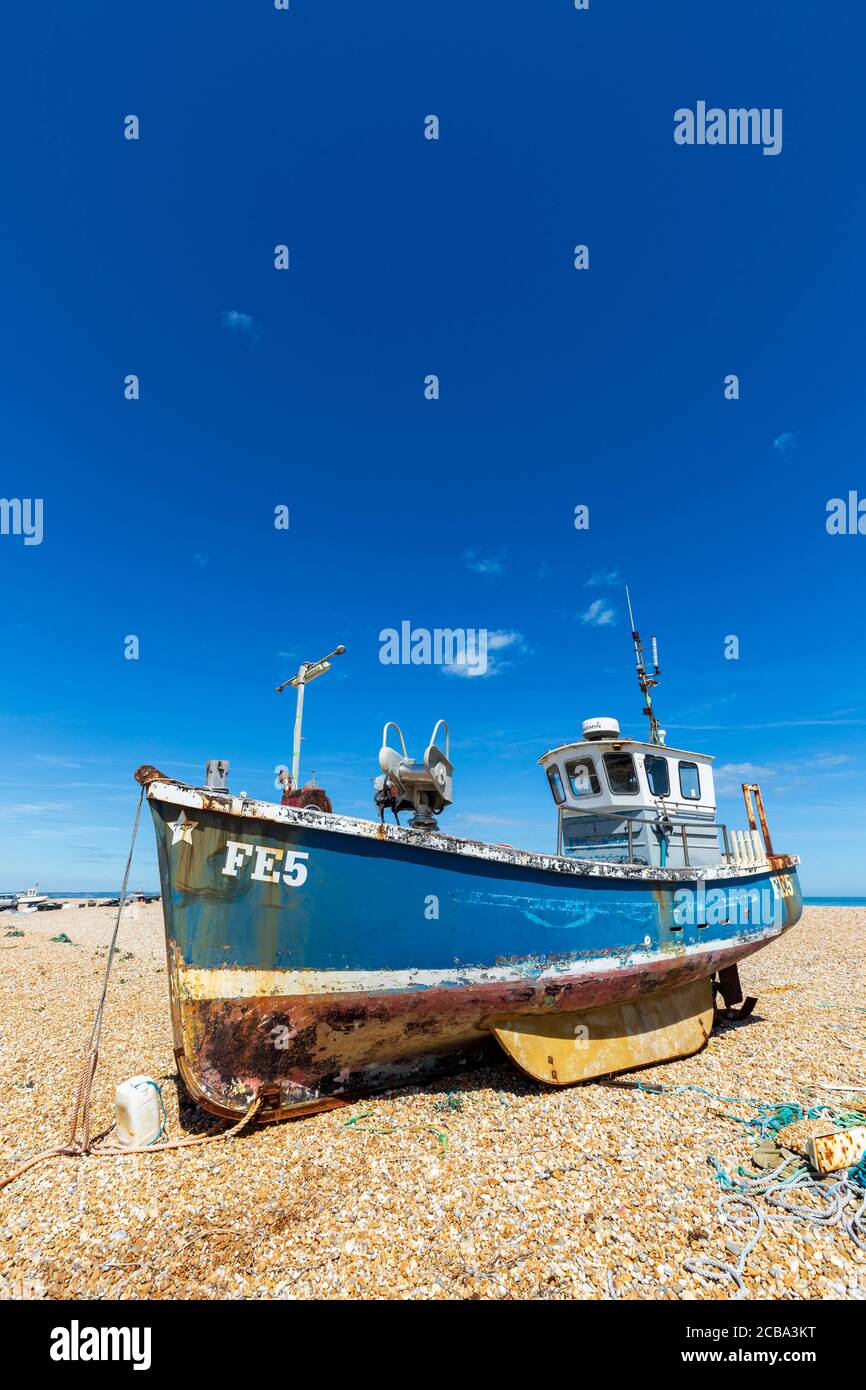 A Fishing boat on the shingle beach at Dungeness in Kent, England Stock ...
