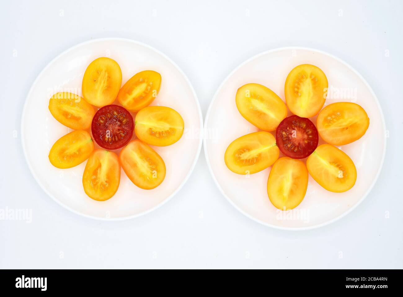 cut tomato flower patterns Stock Photo Alamy