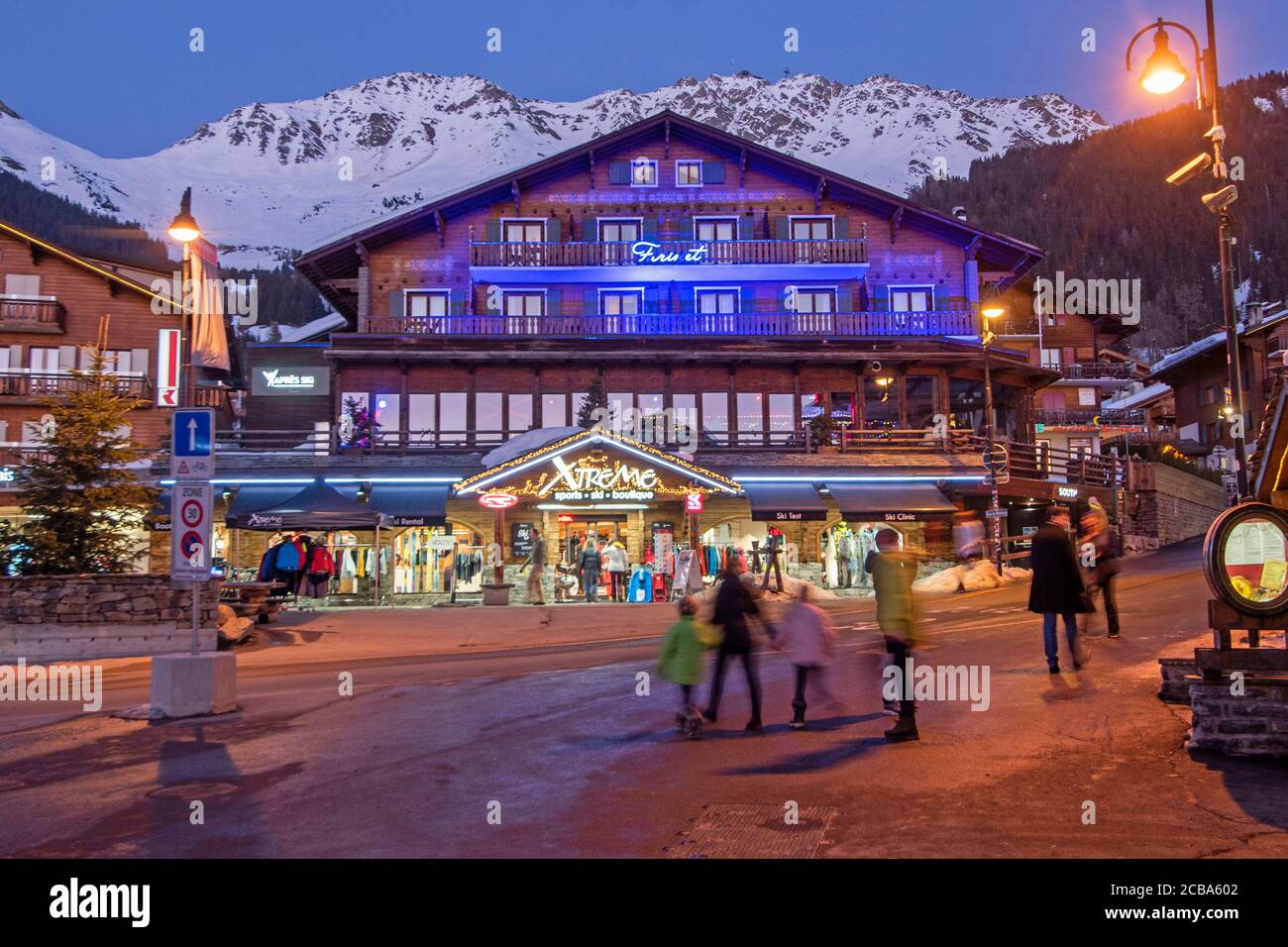 Night in the shopping centre of the ski resort of Verbier located in south-western Switzerland in the canton of Valais. Stock Photo