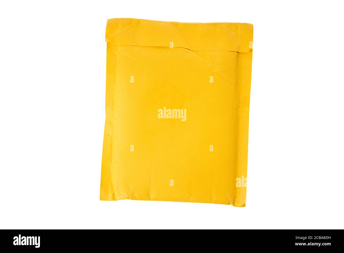 Small paper post packet isolated on the white background Stock Photo