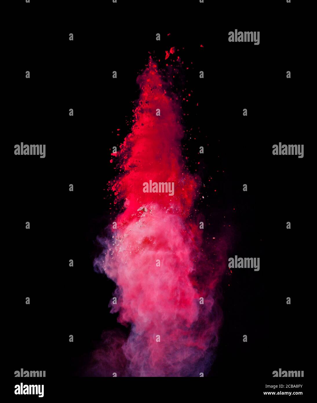 Abstract colored powder explosion isolated on black background. High ...