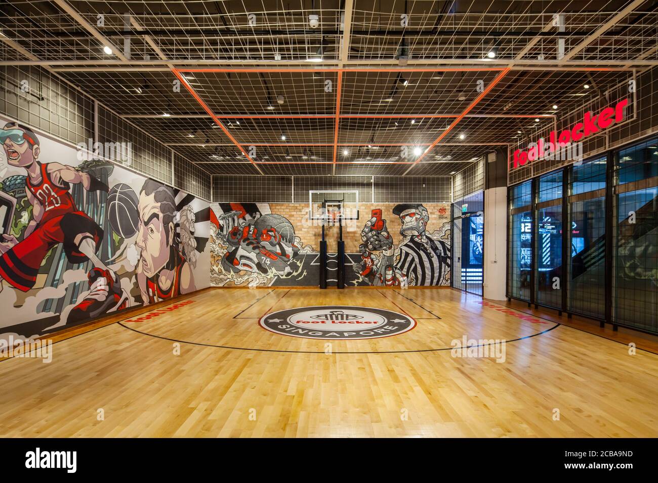 A vibrant graphic basketball court at the basement by Foot Locker, Orchard Gateway at Emerald, Singapore Stock Photo