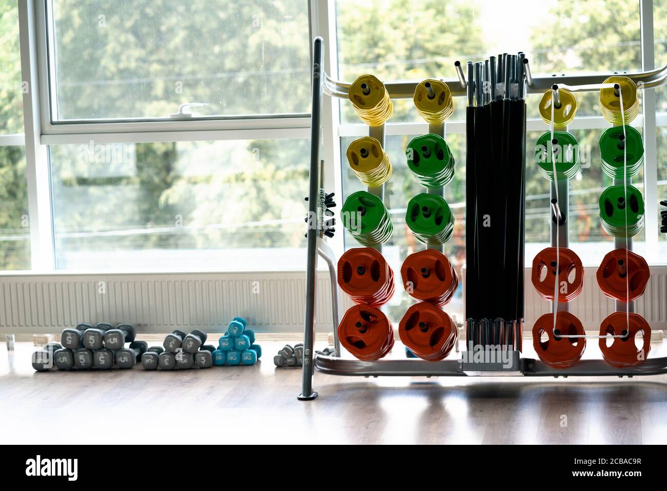Weight in gym room, close up horizontal photo. Sport equipment. Stock Photo