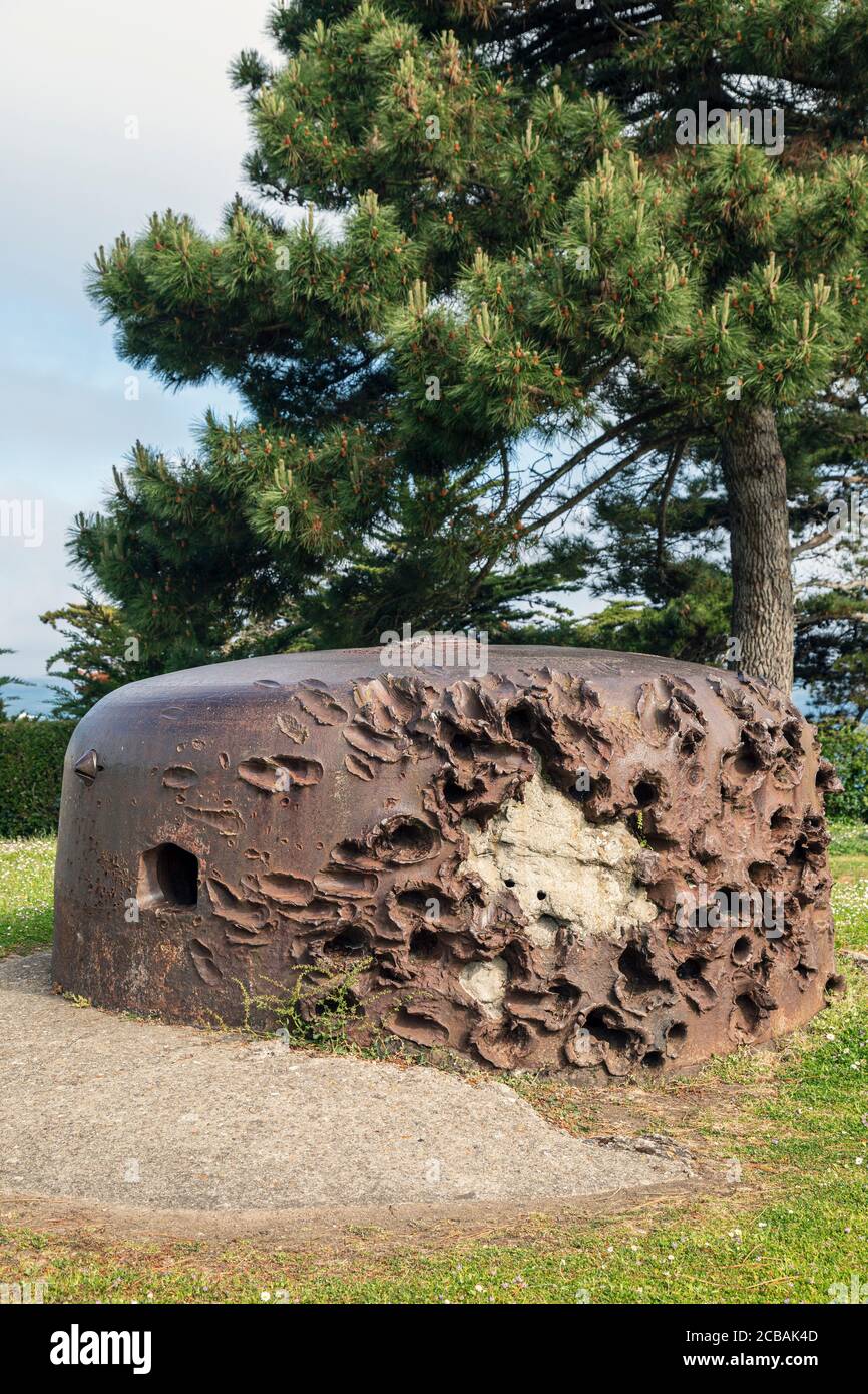 On a headland at Cité d'Alet, Saint-Malo, these German gun emplacements show the scars inflicted by invading allied forces during the Second World War Stock Photo