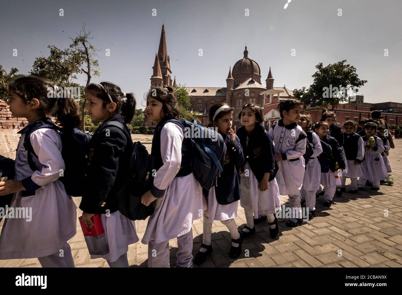 Christian schoolchildren on the premises of the Sacred Heart Cathedral in Lahore in Pakistan. Stock Photo