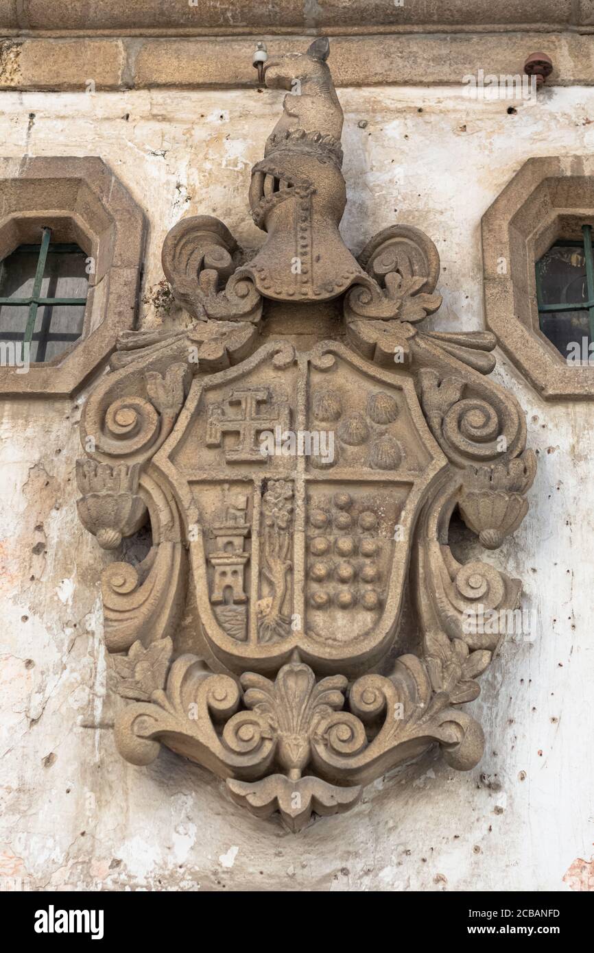 Vila Real / Portugal - 08 01 2020: Detail view at a classic traditional and ornamented coat of arms on a old building Stock Photo