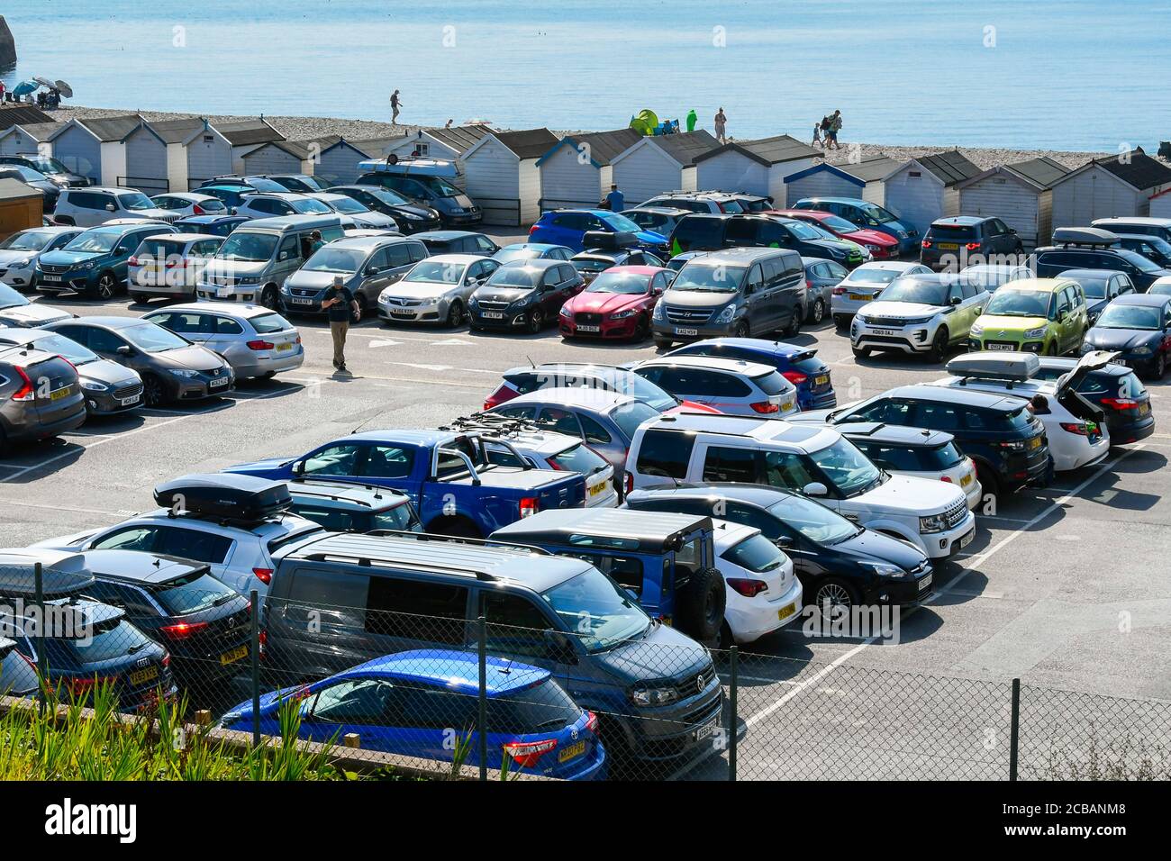 Lyme Regis, Dorset, UK. 12th August 2020. UK Weather. The beach car