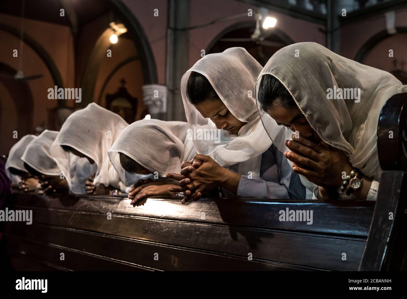 Believers christians during the Friday light fair service in the Sacred Heart Cathedral in Lahore in Pakistan. In 2015, the parish was attacked in the cathedral during a bomb attack where numerous victims were reported. Stock Photo