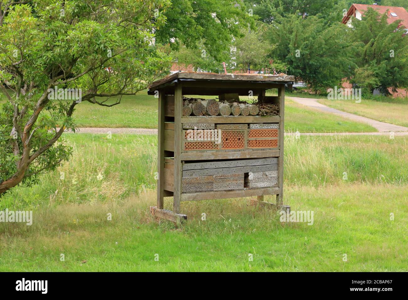 a wild bee and insect shelter hotel Stock Photo - Alamy