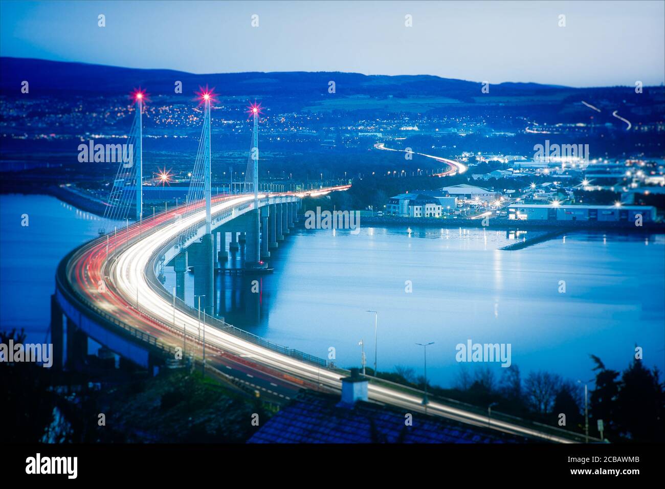 Light trails over Kessock Bridge in Inverness after after. Stock Photo
