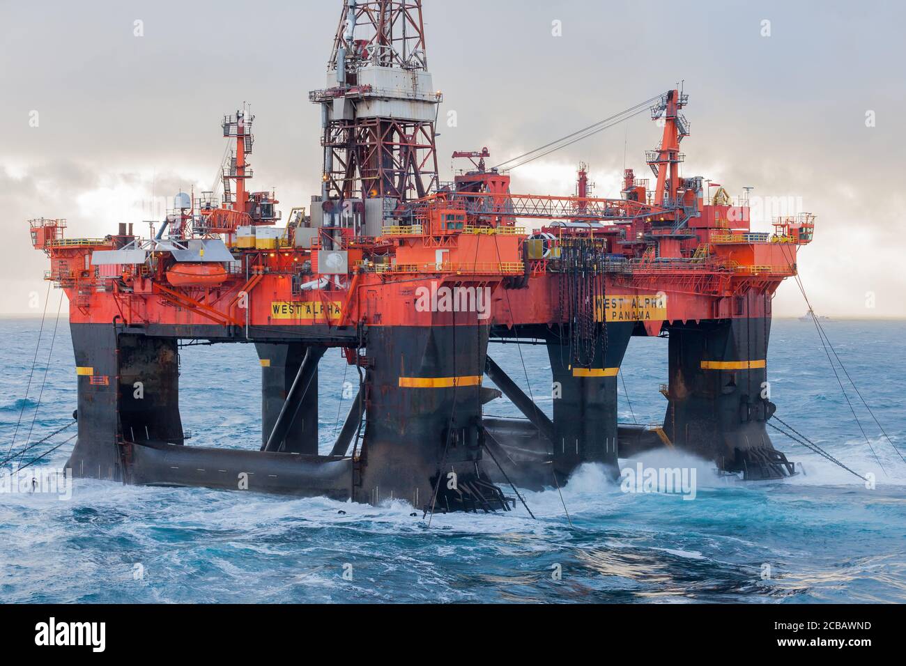 NORTH SEA, NORWAY - 2016 JANUARY 11. Semi Submersible rig West Alpha deballasting and ready for rig move in Norwegian harsh weather condition. Stock Photo