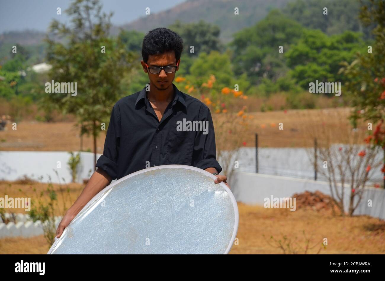 Young Smart Man with Reflector Stock Photo