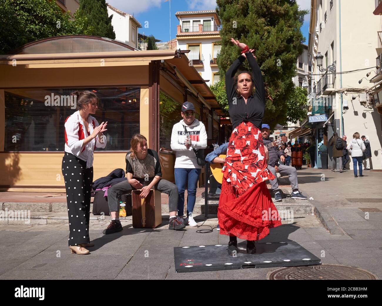 Street entertainers performing Flamenco dances. Plaza Pescaderia, Granada, Analusia, Spain. Stock Photo